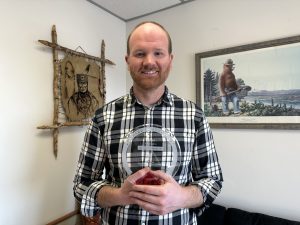 Marcus Cederstrom posing with his access award