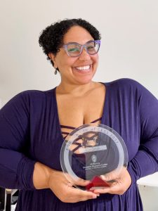 Sami Schalk posing with her access award