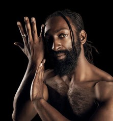 Antoine posing with hands to side of face