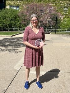 Carol Pope standing outside the Middleton Building with Forward in Access award