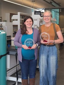 Dr. Amanda Buchberger Jones & Dr. Pam Doolittle with Forward in Access award in a chemistry lab