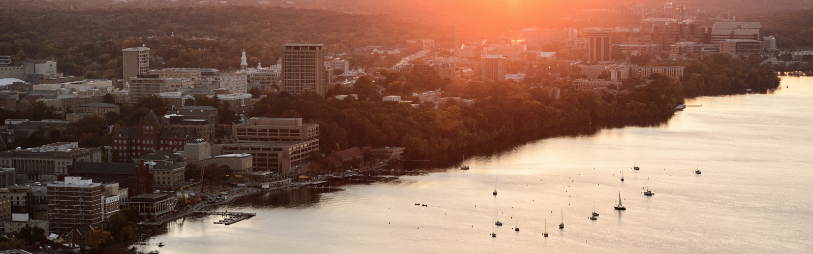 Madison, Wisconsin's lake shoreline at sunset viewed from above.